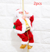 a santa clause ornament hanging from a chain