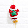 a santa clause ornament hanging on a wall