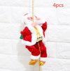 a santa clause ornament hanging from a chain
