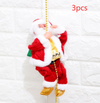 a santa clause ornament hanging from a chain