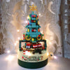 a christmas tree made out of legos on a table