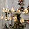 a christmas tree with a bunch of lights hanging from it